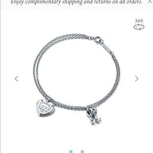 Tiffany’s & Co. bracelet comes with bag and box.